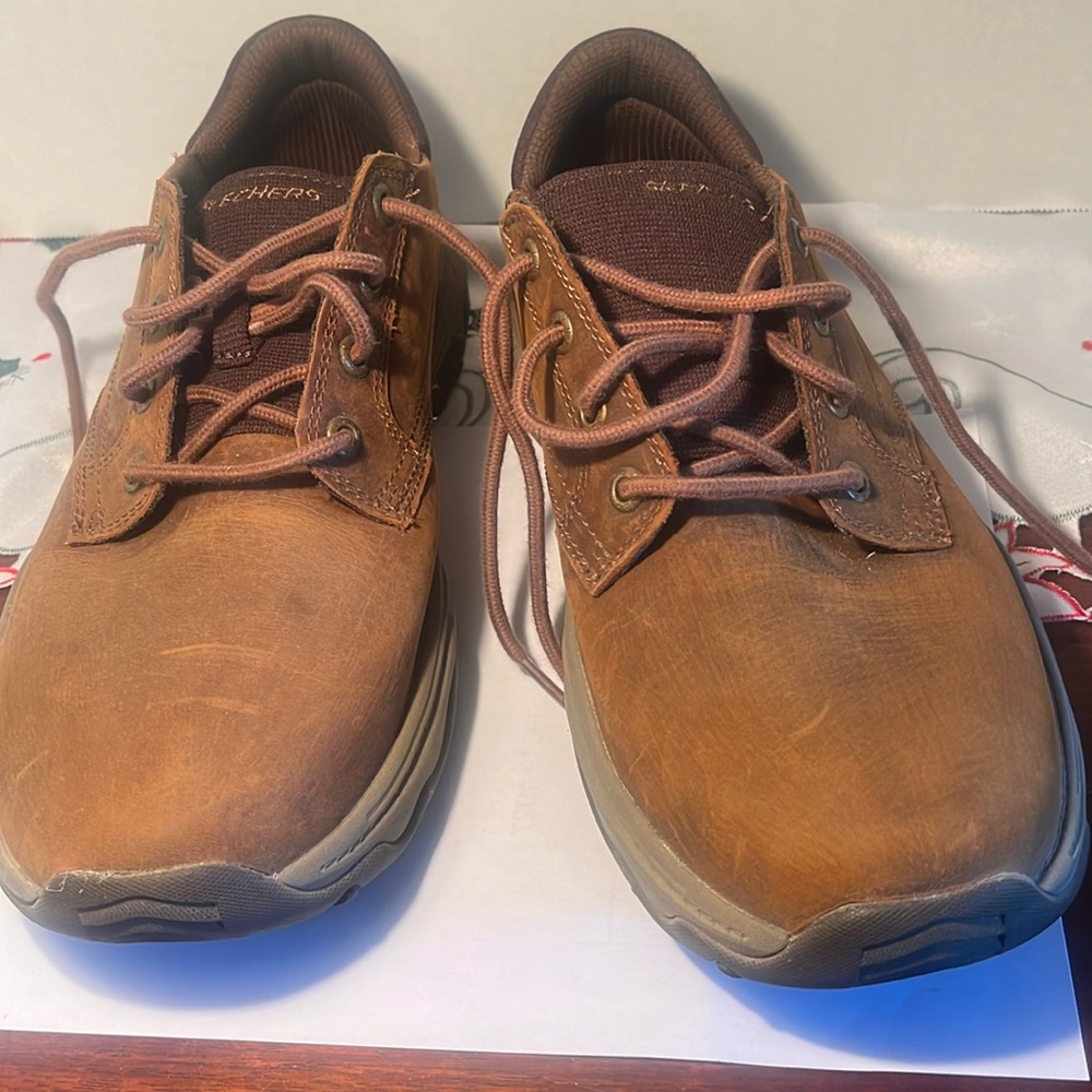 Sketcher men’s air cooled memory foam.Steady Grip sole.  10 1/2 extra wide fit.